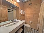 Full bathroom with with a shower and jetted tub combo 